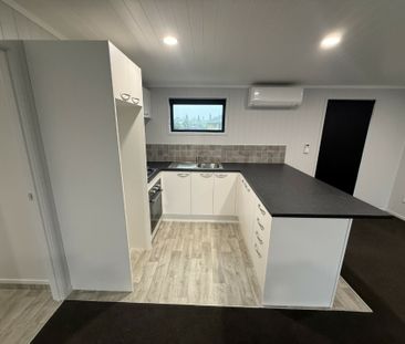 Three-Bedroom Home with Modern Comforts - Photo 6
