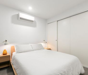 Modern Two-Bedroom Apartment with Secure Parking and Storage - Photo 3