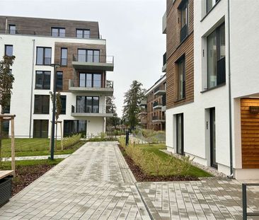 Moderne 2-Zi.-Wohnung mit großer Dachterrasse in schönem Neubauquar... - Photo 1