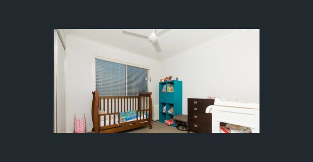 Modern Family Home in Leafy Springfield Lakes - Photo 1