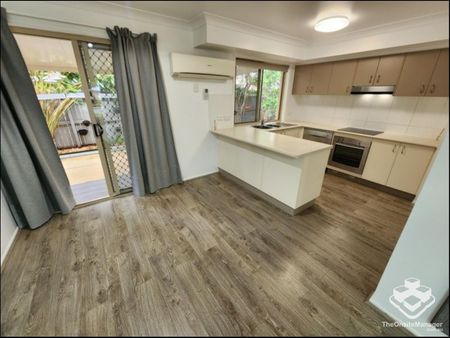 Double Garage, Air-Conditioned and wooden flooring throughout! - Photo 5