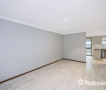 Beautifully Renovated 2-Bedroom Home - Photo 1