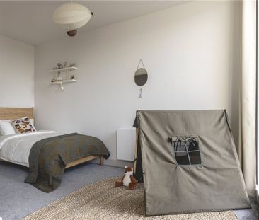 A brand new four bedroom house with a private garden in the heart o... - Photo 6