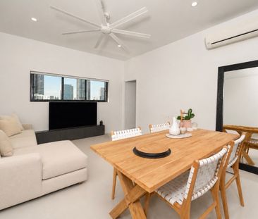 TOP FLOOR LIVING WITH WATER & SKYLINE VIEWS - Photo 1