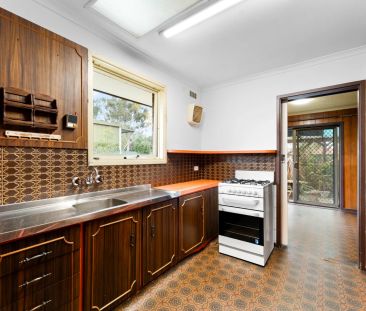 Perfectly Positioned 2-Bed Home with Entertaining Area - Photo 1