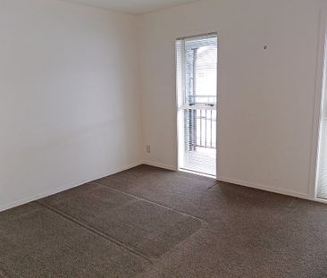 Townhouse Living in fully gated complex with 2 carparks - Photo 1