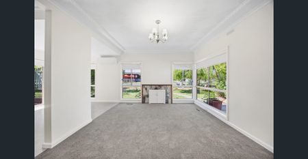 Beautifully refreshed throughout with brand new finishes and thoughtful updates - Photo 3