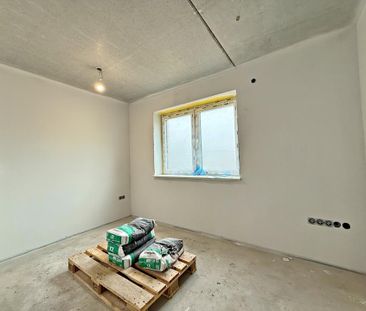 Erstbezug! Obergeschosswohnung in zentraler Lage von Augustfehn | L... - Foto 1