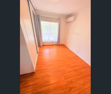 Stylish and Spacious Three-Bedroom Townhouse with Modern Comforts - Photo 2