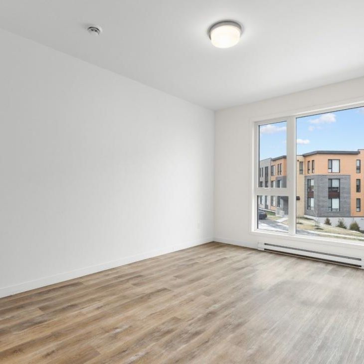 Appartement à louer - Terrebonne (Lachenaie) (Carrefour des Fleurs) Appartement à louer - Terrebonne (Lachenaie) (Carrefour des Fleurs) - Photo 1