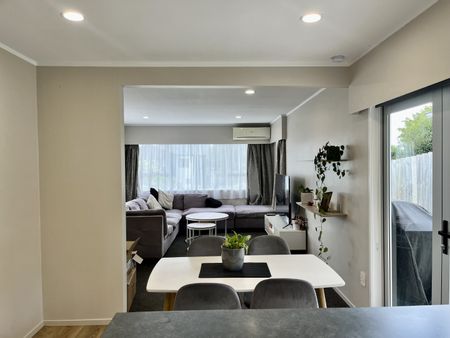 Step into this stunningly renovated home, perfect for stylish and comfortable living. - Photo 2
