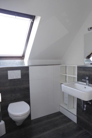 Exklusive 1-Zimmer-DG-Wohnung mit BLK, EBK und Design - Foto 5