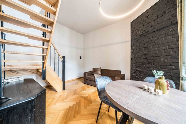 Dwupoziomowe loftowe mieszkanie kamienica Jeżyce 60 m² - Photo 1
