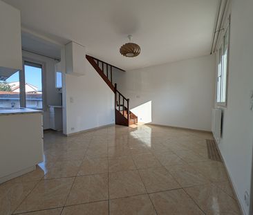 Location Appartement 4 pièces 65m² - Photo 2