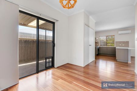 IMMACULATE AND WELL APPOINTED THREE BEDROOM HOME - Photo 2