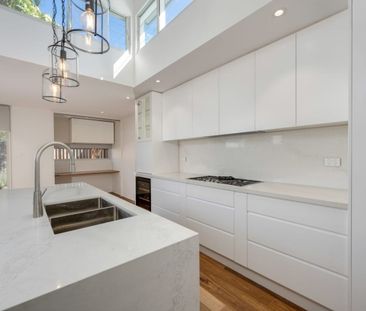 Executive Living at Its Finest - Renovated Two-Bedroom Cottage - Photo 4