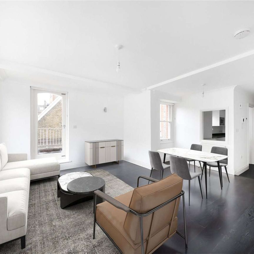 A first and second floor duplex apartment in a recently refurbished building benefitting from two bedrooms and one bathroom with wooden flooring and lift access. - Photo 1