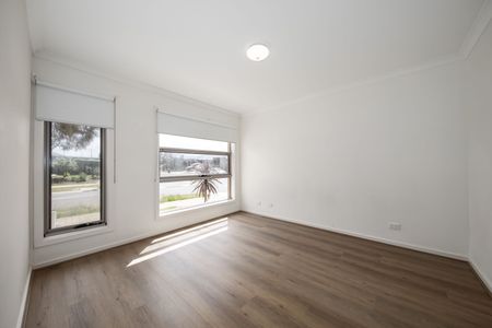 Sleek Style Meets Space: Contemporary Four-Bedroom Home in Highly Sought-After Weir Views - Photo 4