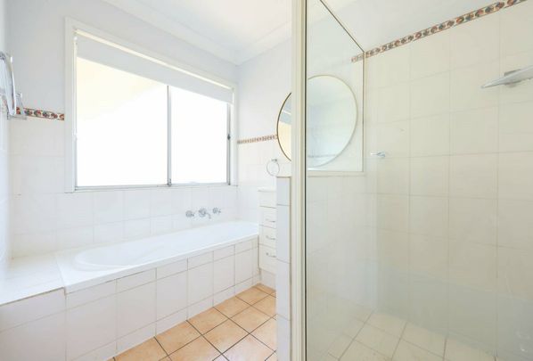 Spacious 4-Bedroom Family Home with Modern Upgrades - Photo 1