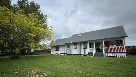 Charming 2-Bedroom Home with Spacious Attic in Waitoki - Photo 3