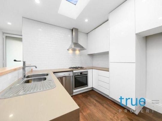 STUNNINGLY PRESENTED SPLIT LEVEL HOME IN IDEAL LOCATION - Photo 1