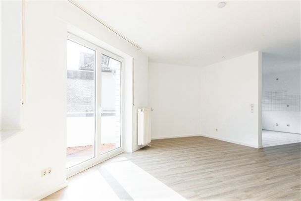 Schick renovierte Erdgeschosswohnung mit Garten in toller Lage der Sieker Schweiz in Bielefeld Ost - Photo 1