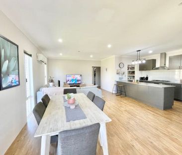 Spacious Family Home with Multiple Living Areas! - Photo 1