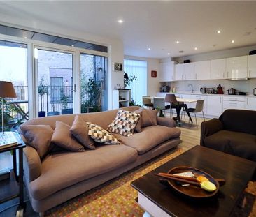 A modern, well presented second floor apartment, situated on the re... - Photo 3