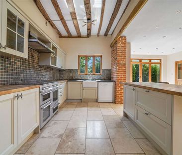 A charming modernised character house situated in a village setting - Photo 6