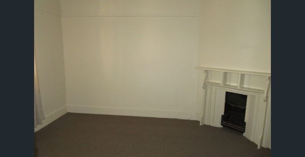 CENTRAL AND RENOVATED 2 BEDROOM SEMI! - Photo 1