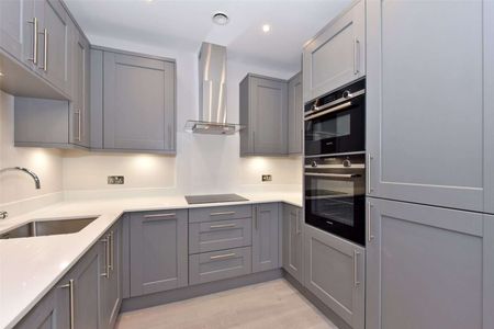 A modern two bedroom first floor apartment with one allocated parking. - Photo 2