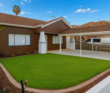 Luxuriously renovated home with landscaped gardens & security system - Photo 1