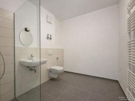Moderne Dachgeschosswohnung mit Aufzug, Fußbodenheizung & Tiefgarage - Foto 4