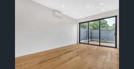 Brand New Townhouse - Effortless Living in Perfect Location - Photo 2