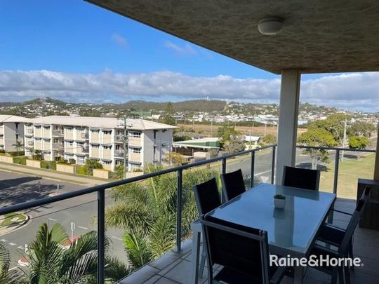 Coastal Living with Poolside Convenience! - Photo 1