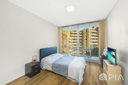 Timber Floor 2 bedroom apartment located in premier Strathfield location! - Photo 3