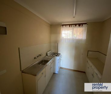 TIDY 2 BEDROOM UPSTAIRS UNIT - Photo 3