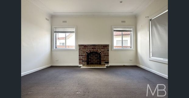 CLASSIC BRICK FAMILY HOME WITH MODERN UPDATES - Photo 1