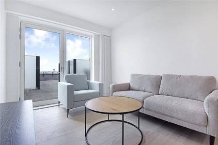 This contemporary two bedroom apartment with roof terrace is located within Wallbrook Gardens, a beautiful development benefitting from exceptional on-site amenities, communal gardens and only a 6-minute walk to Canning Town Station. - Photo 3
