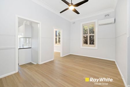 Spacious and Stylish Family Home with Sunroom and Large Backyard - Photo 4