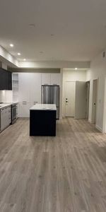 BRAND NEW Top Floor Condo 2Br 2 Bath 1Den & Parking - Photo 4