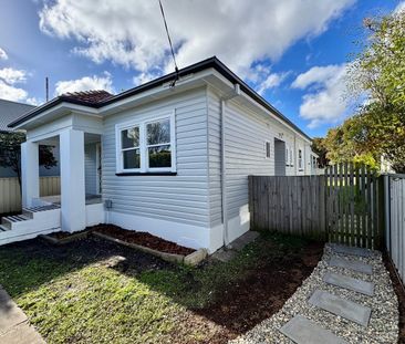 Freshly Updated Home with a Spacious Covered Deck - Photo 6