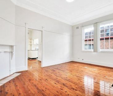 Two Bedroom Duplex Masterpiece Offering Convenience - Photo 1