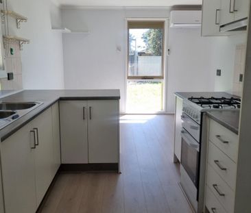 Updated 3 bedroom family home with massive shed - Photo 3