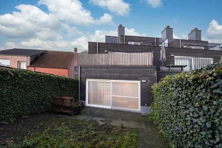 GELIJKVLOERSAPPARTEMENT MET TUIN EN GARAGE - Photo 5