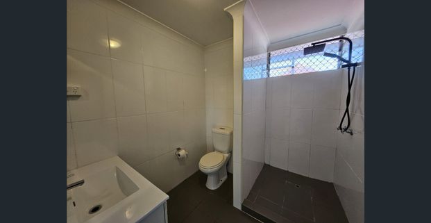 Fully Air Conditioned Top Floor Unit with wrap around balcony and White Goods Included! Close to City Centre & Hospital - Photo 1