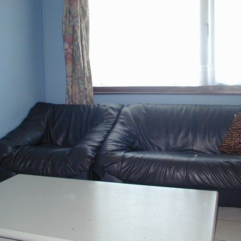 Studio op het gelijkvloers op een binnenplein met een aparte slaapkamer. - Photo 1