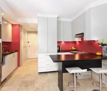 Oversized One-Bedroom Unit with Huge Courtyard in Resort-Style Complex - Photo 2