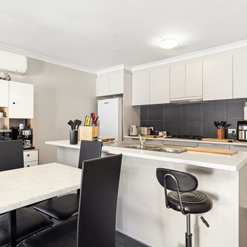 MODERN TOWNHOUSE LIVING IN PRIVATE COMPLEX - Photo 1