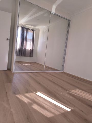 Fully Renovated, Four Bedroom Family Home - Photo 4